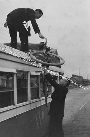 CONDUCTOR LOADING BIKE ON G S R BUS KINGSBRIDGE